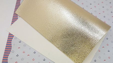 Штучна шкіра для рукоділля , середньозерниста, А4 колір глянцевий металік Золото шампань, 1 шт
