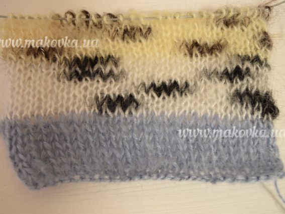 Зразок зв'язаний з ниток трьох різних кольорів: однотонного і меланжу