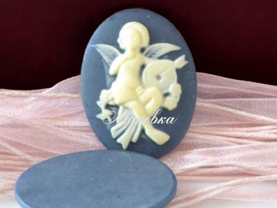 Камея №10 Амур с лирой, овал 39х30 мм Камея №10 Амур с лирой, овал 39х30 мм