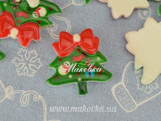 Кабошон Елка-2 с бантом 20х20 мм 1 шт Кабошон Елка-2 с бантом 20х20 мм 1 шт