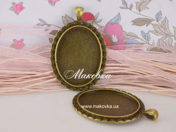 Основа під камею №27, ОВАЛ з хрестиками 58х39х3 мм (30х40) мм, антична бронза, 1 шт Основа під камею №27, ОВАЛ з хрестиками 58х39х3 мм (30х40) мм, антична бронза, 1 шт