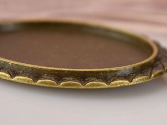 Основа під камею №26, ОВАЛ з хрестиками 58х39х3 мм (для камеї 30х40) мм, антична бронза, 1 шт