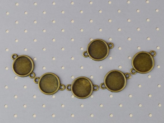 Основа під камінь №39, Коло з двома кільцями 59х41 мм (25х35) мм, антична бронза, 1 шт