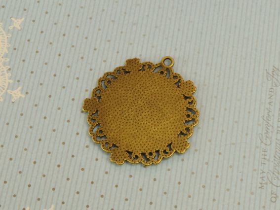 Оправа для кабошона кругла з квіточками 42х47 мм, колір антична бронза №48