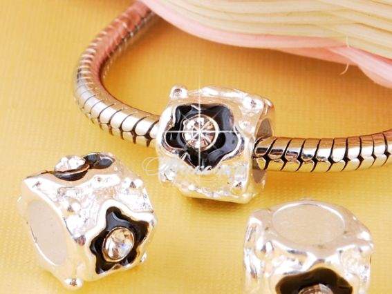 Бусина метал. цветная со стразами 01 с черным цветочком