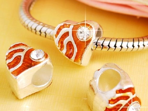 Бусина метал. цветная со стразой 08 Листик оранжевая Бусина метал. цветная со стразой 08 Листик оранжевая