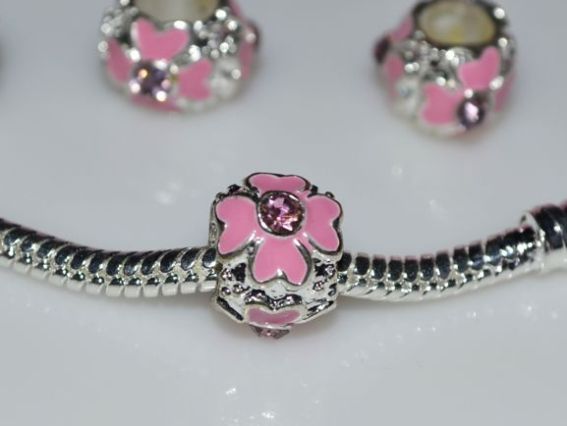 Бусина метал. цветная со стразой Крест розовая Бусина метал. цветная со стразой Крест розовая