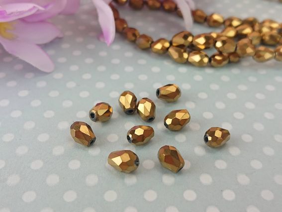 Кришталеві намистини, форма Капля, розмір 5*7мм , металік Золото 10 шт