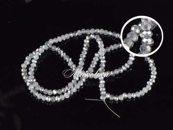 Кришталь 3х4 мм Срібло + прозорий білий , 1 низка Кришталь 3х4 мм Срібло + прозорий білий , 1 низка