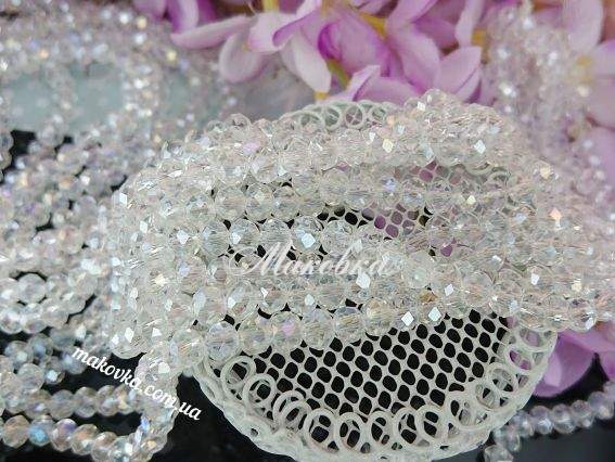 Кришталь 6х4 мм №30, біла з перламутром 1 низка Кришталь 6х4 мм №30, біла з перламутром 1 низка