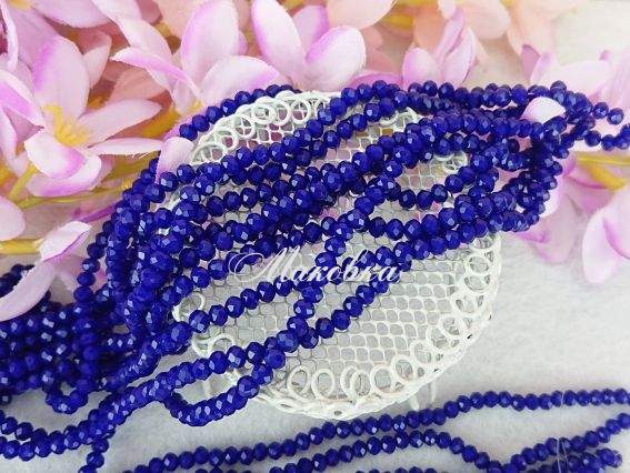 Кришталь 3х4 мм (120) №74, темно-сині непрозорі, 1 низка Кришталь 3х4 мм (120) №74, темно-сині непрозорі, 1 низка