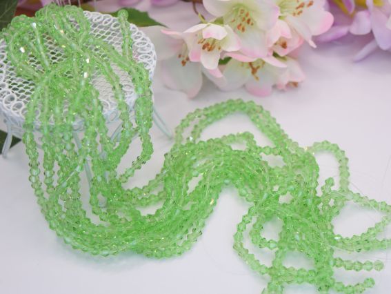  Намистини кришталь Біконус Грановані 4*3 мм, колір №07 салатовий, 1 низка,