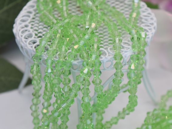  Намистини кришталь Біконус Грановані 4*3 мм, колір №07 салатовий, 1 низка,