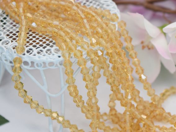  Намистини кришталь Біконус Грановані 4*3 мм, колір №08 Gold Champagne, 1 низка,