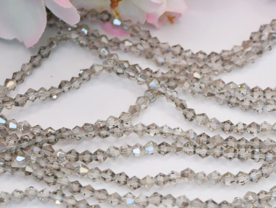  Намистини кришталь Біконус Грановані 4*3 мм, колір №12 Прозорий з частковим срібним покриттям, 1 низка,