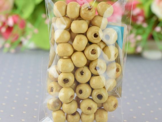 Намисто дерев'яні 8*7 мм, круглі, 50 шт колір БЕЖ