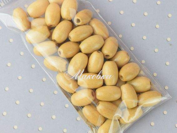 Набір дерев'яних намистин, зерно 12*7мм БЕЖ, 10 г Набір дерев'яних намистин, зерно 12*7мм БЕЖ, 10 г