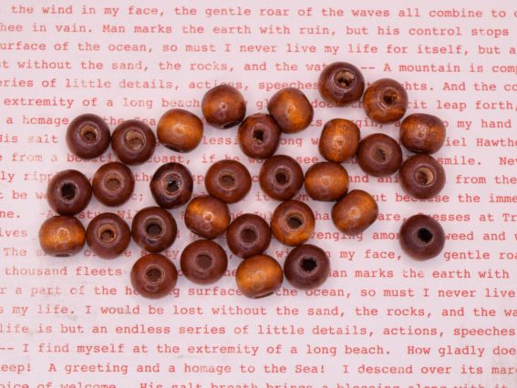 Набір дерев'яних намистин 9*10мм Світло-Коричневі, 10г