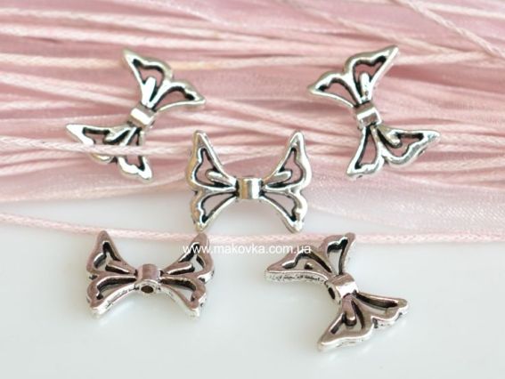 Металлическая бусина №17 Бантик 15х13 мм, античное серебро, 1 шт Металлическая бусина №17 Бантик 15х13 мм, античное серебро, 1 шт