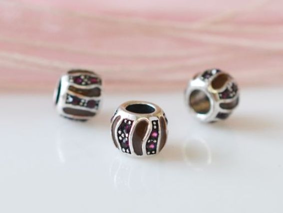 Бусина метал. цветная со стразой 23 коричневая с фиолетовым Бусина метал. цветная со стразой 23 коричневая с фиолетовым