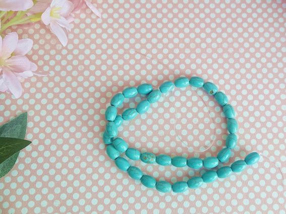 НК-101 Намистини з Бірюзи синтетичної, зерно, 8х10 мм, низка