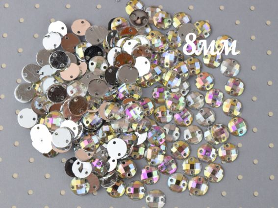 Камінці пришивні багатогранні 8 мм, круглі, срібні голографічні, 10г/уп Камінці пришивні багатогранні 8 мм, круглі, срібні голографічні, 10г/уп