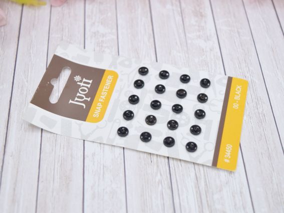 Набір кнопок 34450 JYOTI, чорні пришивні, діаметр 6 мм, 20 шт /уп Набір кнопок 34450 JYOTI, чорні пришивні, діаметр 6 мм, 20 шт /уп