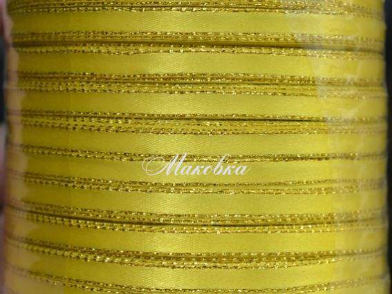 Стрічка атласна 6 мм з люрексом - жовта із золотом, 1 бобіна Стрічка атласна 6 мм з люрексом - жовта із золотом, 1 бобіна