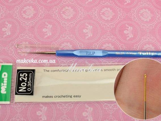 Крючок Tulip TА-1054e стальной с пластиковой ручкой №25 ( 0,35 мм) Крючок Tulip TА-1054e стальной с пластиковой ручкой №25 ( 0,35 мм)