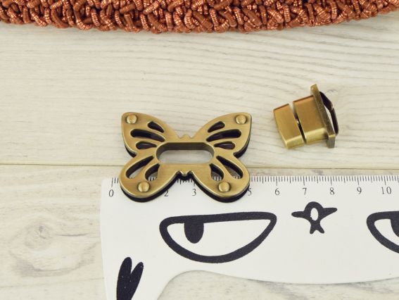 Сумочний замочок Твіст МЕТЕЛИК платина 50х35мм 1 шт