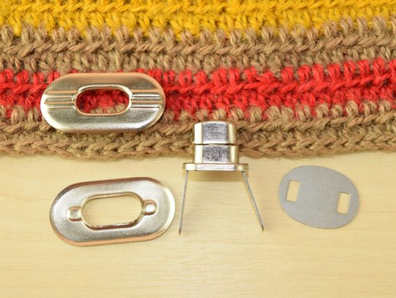 Сумочний замочок Твіст №4593 ПЛАТИНА овальний поворотний (Твіст) 35х18мм 1 шт