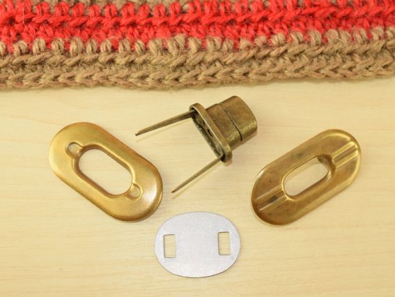 Замок для сумки №4593 антична БРОНЗА овальний поворотний (Твіст) 35х18мм Замок для сумки №4593 антична БРОНЗА овальний поворотний (Твіст) 35х18мм