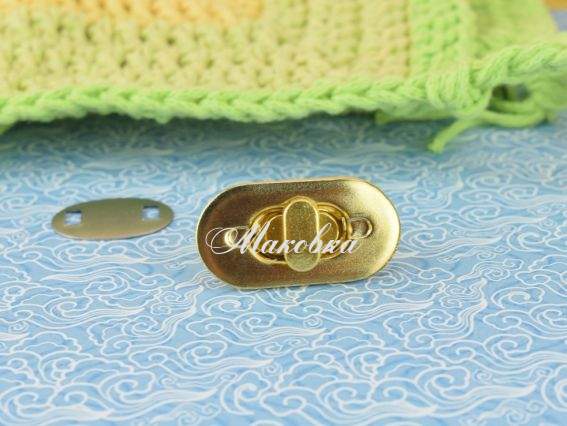 Замок для сумки №4593 ЗОЛОТО овальный поворотный (Твист) 35х18мм 1 шт