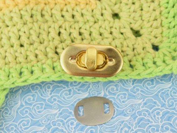 Сумочний замочок Твіст №4593 колір ЗОЛОТО  овальний поворотний (Твіст) 35х18мм 1 шт